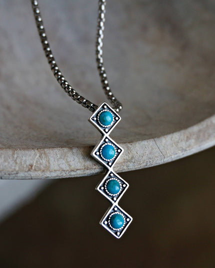 Itotia Turquoise Necklace: Stainless steel 22-24"
